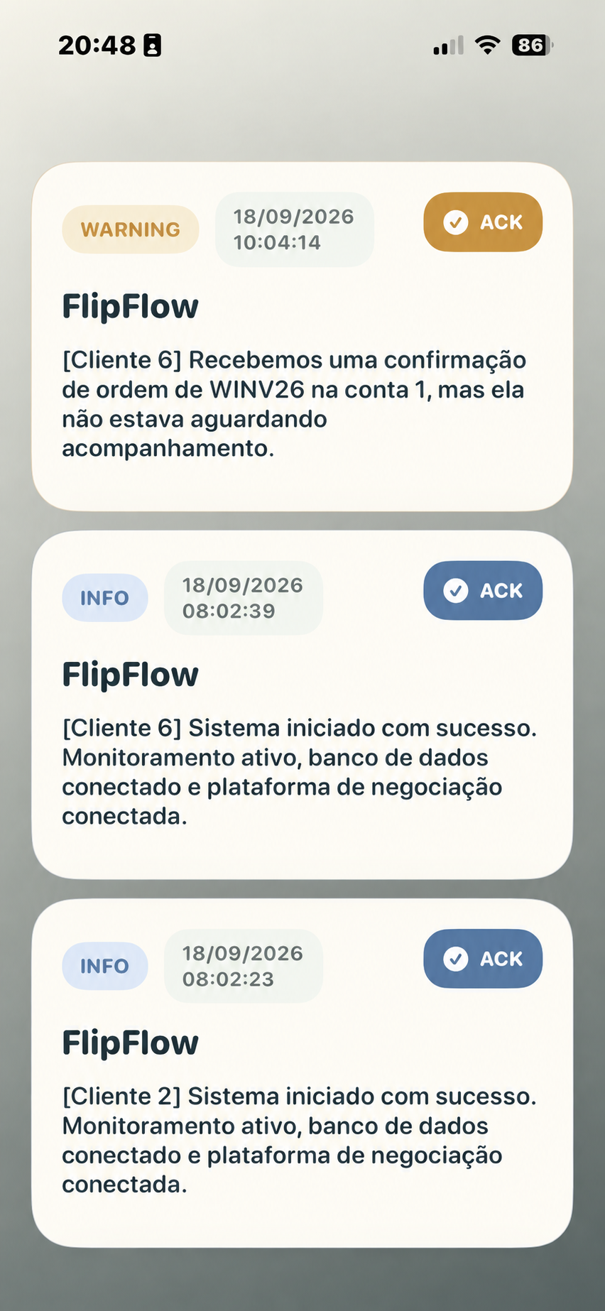 Tela vertical do aplicativo FlipFlow com um aviso de confirmação de ordem e duas notificações de inicialização do sistema.